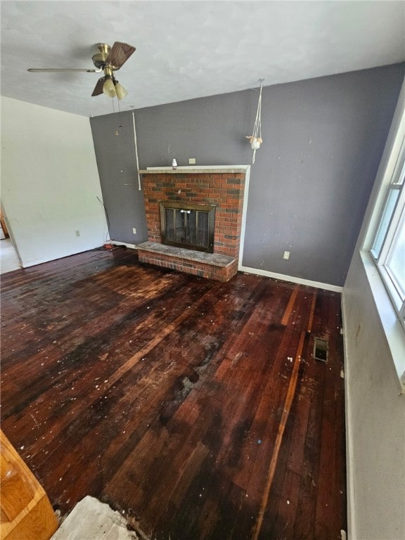 120 Upper Clinton St, Canoe/Banks Twps, PA 15772 - unfurnished living room with wood-type flooring, a fireplace, and ceiling fan