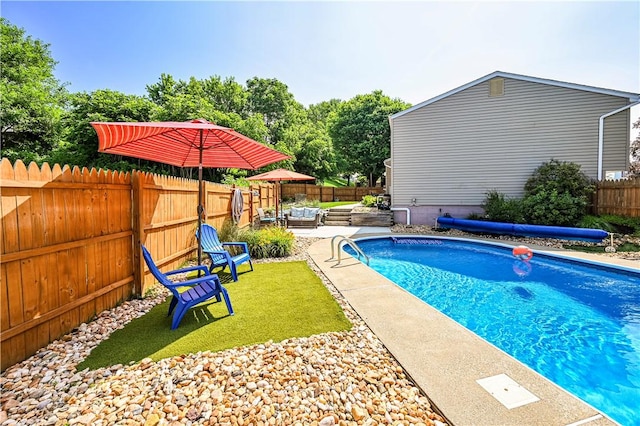 221 Wheatfield Dr, Hempfield Twp, PA 15601 - view of pool with a fenced backyard and a patio area
