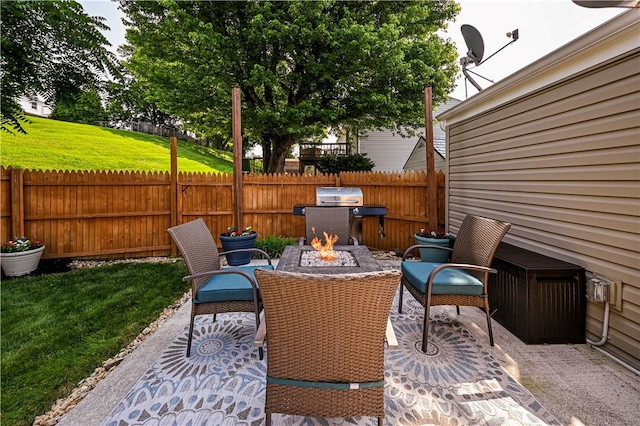 221 Wheatfield Dr, Hempfield Twp, PA 15601 - view of patio with an outdoor fire pit and a grill