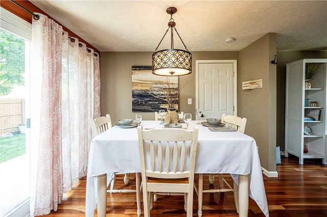 221 Wheatfield Dr, Hempfield Twp, PA 15601 - dining area featuring wood finished floors and baseboards