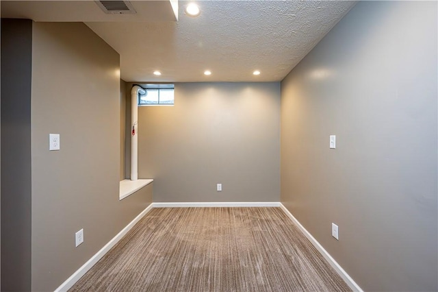 221 Wheatfield Dr, Hempfield Twp, PA 15601 - below grade area with a textured ceiling, recessed lighting, and carpet