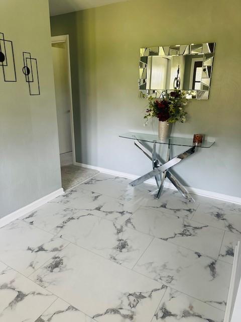 7 Indian Ln, Perry Twp, PA 15486 - hallway with baseboards and marble finish flooring