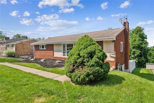 1533 Missouri Ave, South Park, PA 15017 - view of front of house featuring a chimney, brick siding, and a front yard