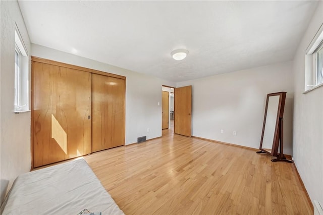 1533 Missouri Ave, South Park, PA 15017 - unfurnished bedroom with light wood-style flooring, a closet, and a baseboard heating unit