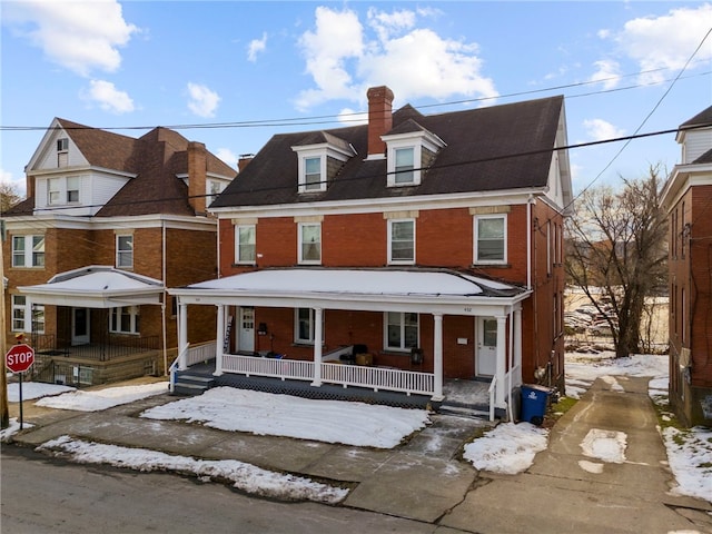 432-434 E Chestnut St E, Washington Boro, PA 15301 - multi unit property with brick siding, a porch, and a chimney