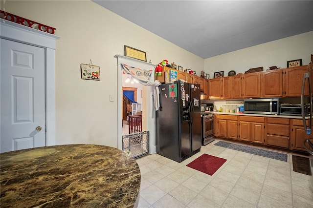 432-434 E Chestnut St E, Washington Boro, PA 15301 - kitchen with appliances with stainless steel finishes and brown cabinets