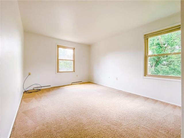 5380 Tuscarawas Rd, Brighton Twp, PA 15009 - carpeted empty room featuring healthy amount of natural light and baseboard heating