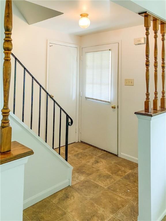 5380 Tuscarawas Rd, Brighton Twp, PA 15009 - foyer with stone finish flooring and stairs