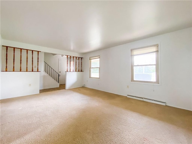5380 Tuscarawas Rd, Brighton Twp, PA 15009 - carpeted spare room with a baseboard radiator and stairs