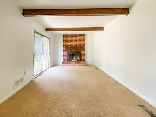 5380 Tuscarawas Rd, Brighton Twp, PA 15009 - unfurnished living room featuring a brick fireplace, carpet flooring, and beam ceiling