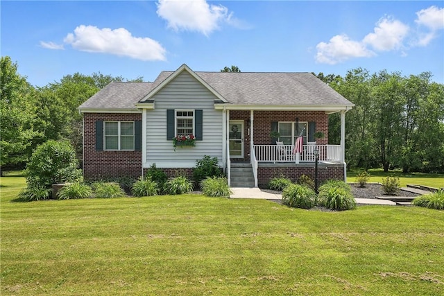 202 Ringneck Meadow Dr, Worth Twp, PA 16057 - view of front of home featuring a porch, brick siding, a front yard, and roof with shingles
