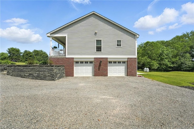 202 Ringneck Meadow Dr, Worth Twp, PA 16057 - view of side of home with driveway, an attached garage, a yard, and brick siding