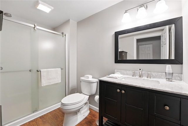 202 Ringneck Meadow Dr, Worth Twp, PA 16057 - bathroom with vanity, a stall shower, and wood finished floors