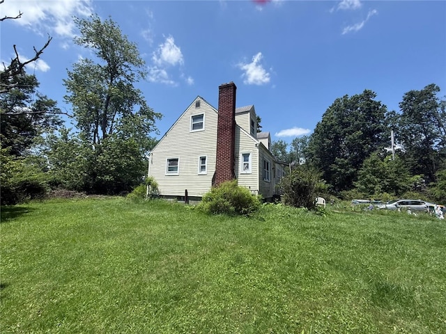 2425 Degenhardt Rd, Hampton, PA 15044 - view of side of property featuring a chimney and a lawn