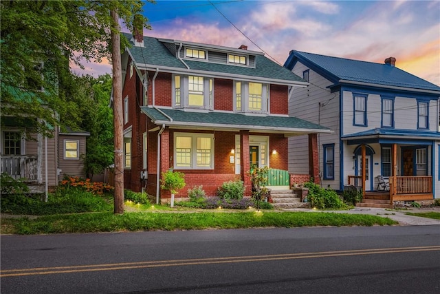 429 S Center Ave, Somerset Boro, PA 15501 - traditional style home with covered porch, brick siding, and a chimney