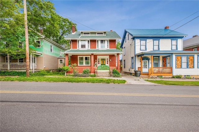 429 S Center Ave, Somerset Boro, PA 15501 - american foursquare style home featuring a porch, a chimney, and brick siding