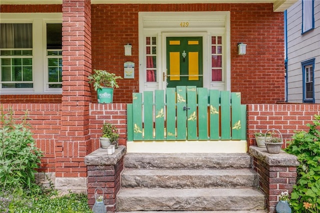 429 S Center Ave, Somerset Boro, PA 15501 - view of exterior entry featuring brick siding and covered porch