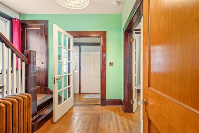 429 S Center Ave, Somerset Boro, PA 15501 - foyer featuring radiator, wood finished floors, french doors, and stairway