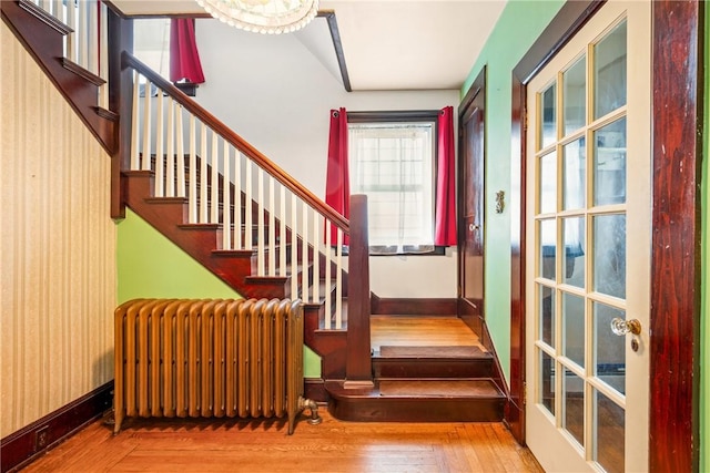 429 S Center Ave, Somerset Boro, PA 15501 - stairs with radiator heating unit and wood-type flooring