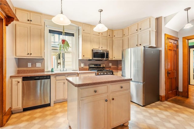 429 S Center Ave, Somerset Boro, PA 15501 - kitchen with appliances with stainless steel finishes, light flooring, light countertops, a kitchen island, and decorative light fixtures
