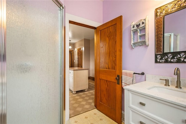 429 S Center Ave, Somerset Boro, PA 15501 - bathroom with tile patterned floors, a shower stall, and vanity
