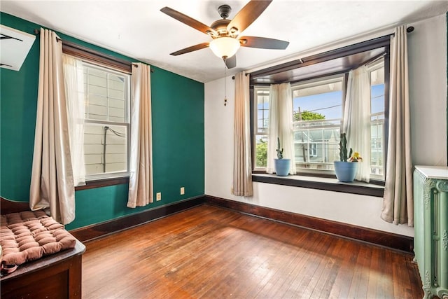 429 S Center Ave, Somerset Boro, PA 15501 - unfurnished room featuring radiator heating unit, wood-type flooring, and ceiling fan