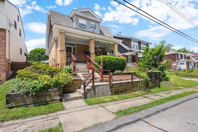 310 Columbia Ave, West View, PA 15229 - traditional style home with brick siding, a porch, and stairs