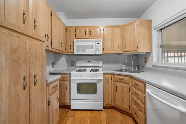 310 Columbia Ave, West View, PA 15229 - kitchen with white appliances, light wood-type flooring, and light countertops