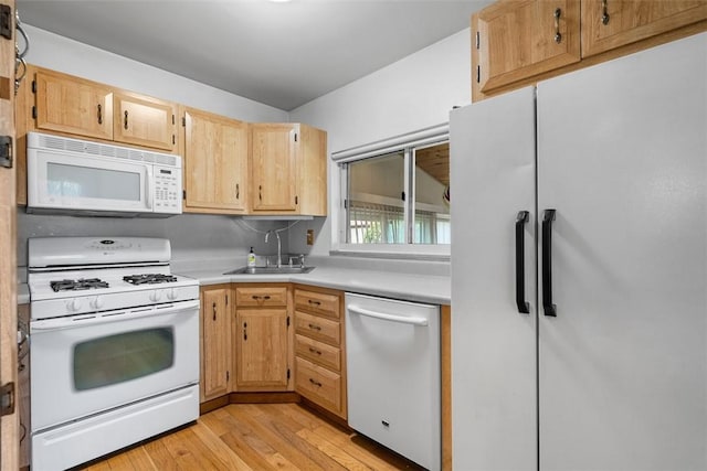 310 Columbia Ave, West View, PA 15229 - kitchen featuring white appliances, light wood-style flooring, light countertops, and light brown cabinets