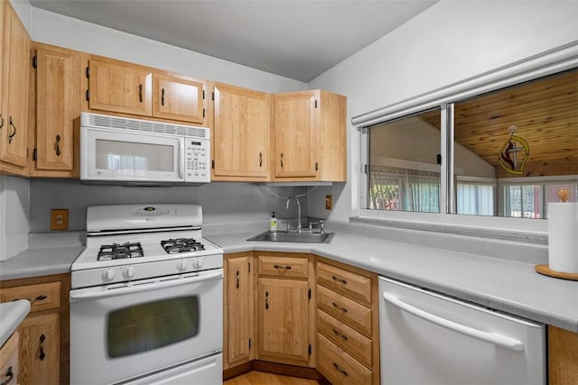 310 Columbia Ave, West View, PA 15229 - kitchen featuring white appliances, lofted ceiling, light countertops, and light wood-type flooring