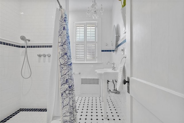 310 Columbia Ave, West View, PA 15229 - full bath with a tile shower, a chandelier, tile walls, a wainscoted wall, and tile patterned flooring