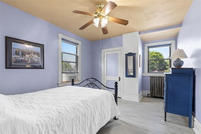 310 Columbia Ave, West View, PA 15229 - bedroom featuring radiator, light wood finished floors, and ceiling fan
