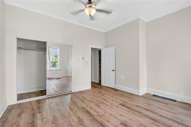 201 La Belle St, Mt Washington, PA 15211 - unfurnished bedroom with ornamental molding, wood finished floors, ceiling fan, and a closet