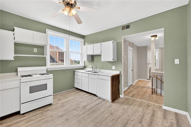 201 La Belle St, Mt Washington, PA 15211 - kitchen with white appliances, light wood finished floors, white cabinets, a ceiling fan, and light countertops