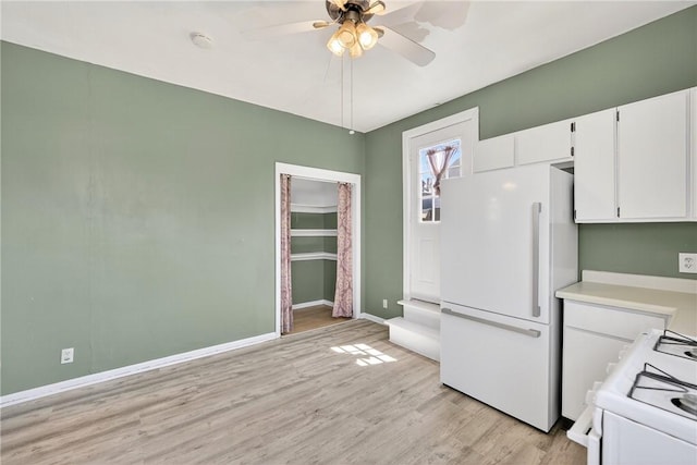 201 La Belle St, Mt Washington, PA 15211 - kitchen with white appliances, light countertops, light wood-style flooring, white cabinets, and a ceiling fan