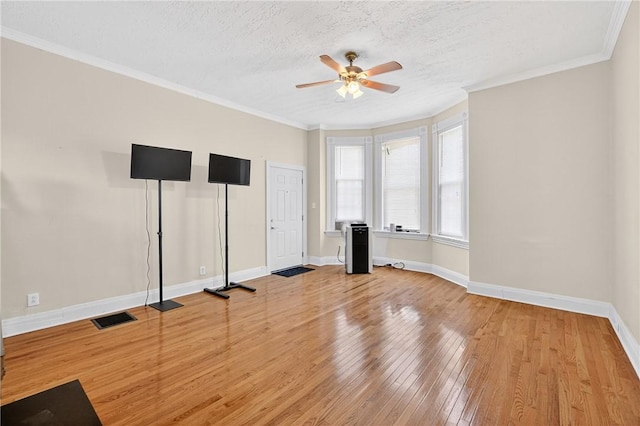 201 La Belle St, Mt Washington, PA 15211 - workout room featuring a ceiling fan, light wood-style flooring, ornamental molding, and a textured ceiling