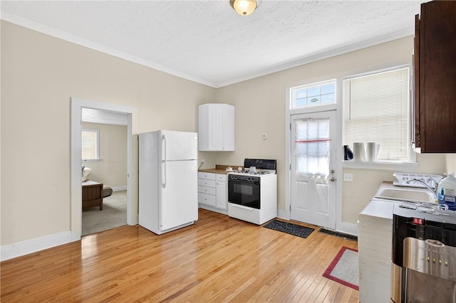 201 La Belle St, Mt Washington, PA 15211 - kitchen featuring white appliances, light wood finished floors, white cabinets, crown molding, and a textured ceiling