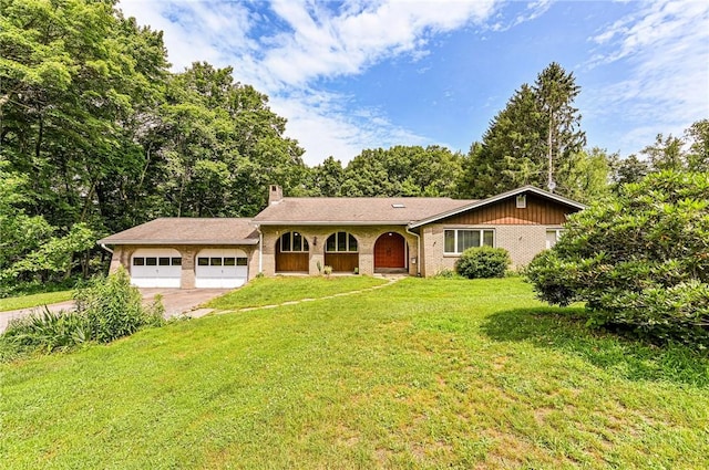 483 Twin Lakes Rd, Unity Twp, PA 15650 - ranch-style house with a garage, concrete driveway, a chimney, a front lawn, and brick siding