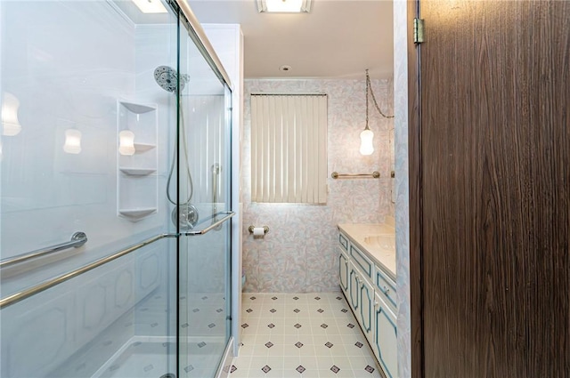 483 Twin Lakes Rd, Unity Twp, PA 15650 - full bathroom with a shower stall, vanity, wallpapered walls, and tile patterned floors