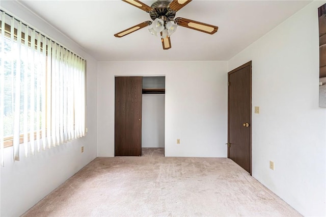 483 Twin Lakes Rd, Unity Twp, PA 15650 - unfurnished bedroom with carpet floors, a closet, and a ceiling fan