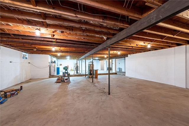 483 Twin Lakes Rd, Unity Twp, PA 15650 - unfinished below grade area featuring gas water heater and concrete block wall