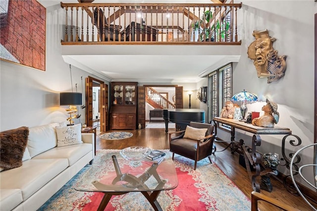 633 Westminster Rd, Hermitage, PA 16148 - living area with stairway, wood finished floors, a towering ceiling, and ornamental molding
