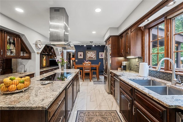 633 Westminster Rd, Hermitage, PA 16148 - kitchen featuring light marble finish flooring, black electric stovetop, freestanding refrigerator, island range hood, and light stone counters