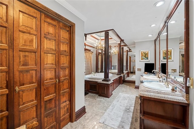 633 Westminster Rd, Hermitage, PA 16148 - bathroom with double vanity, recessed lighting, ornamental molding, and decorative columns