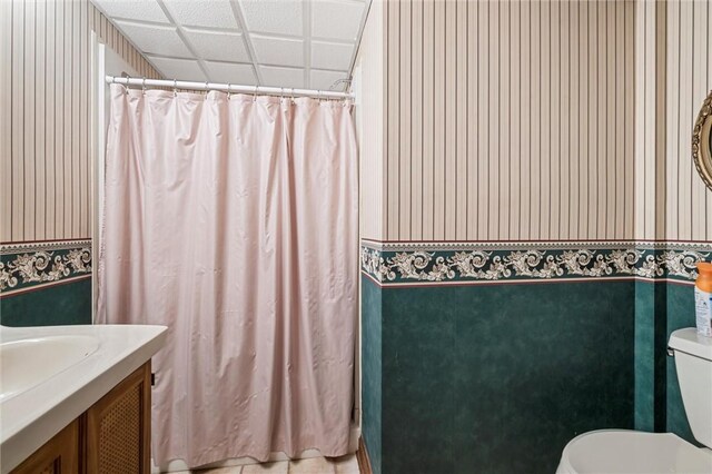 633 Westminster Rd, Hermitage, PA 16148 - bathroom featuring vanity, a shower with shower curtain, and wallpapered walls