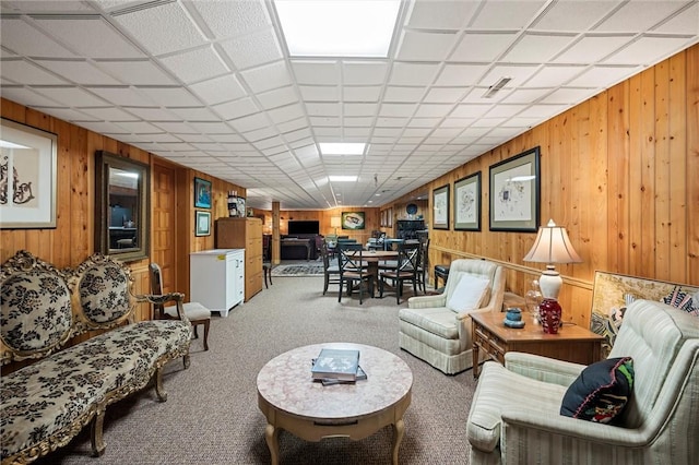 633 Westminster Rd, Hermitage, PA 16148 - living area featuring carpet flooring, wood walls, and a paneled ceiling
