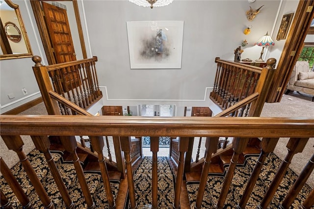 633 Westminster Rd, Hermitage, PA 16148 - staircase with carpet floors and a chandelier