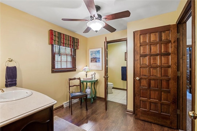 633 Westminster Rd, Hermitage, PA 16148 - bathroom with wood finished floors, ceiling fan, and vanity
