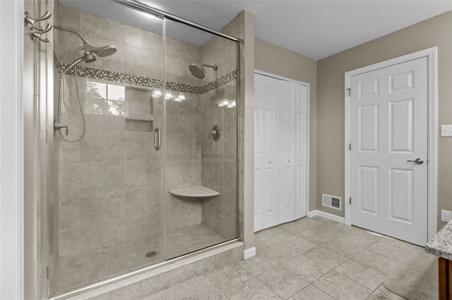 294 Connoquenessing Main St, Connoquenessing Boro, PA 16033 - bathroom featuring a stall shower, tile patterned flooring, and vanity