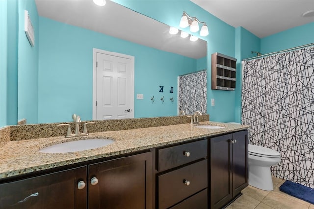 294 Connoquenessing Main St, Connoquenessing Boro, PA 16033 - full bath featuring double vanity, tile patterned floors, and a shower with curtain